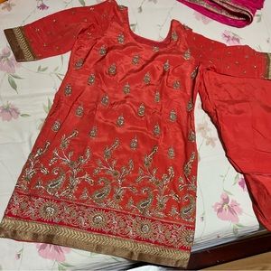 peachy orange punjabi suit with full heavy embroidery and patiyala salwar